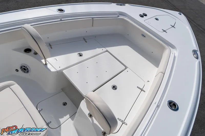Slide: The Image of 2026 Sea Hunt Ultra 275 SE boat interior with seating and storage compartments. - 15