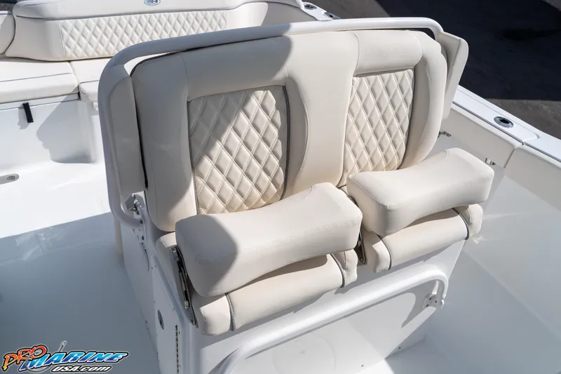 Slide: The Image of 2026 Sea Hunt Ultra 275 SE boat seats with diamond-patterned upholstery. - 19