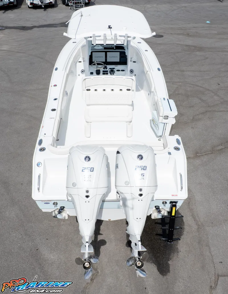 Slide: The Image of 2026 Sea Hunt Ultra 275 SE boat with dual 250 horsepower engines, aerial view. - 9