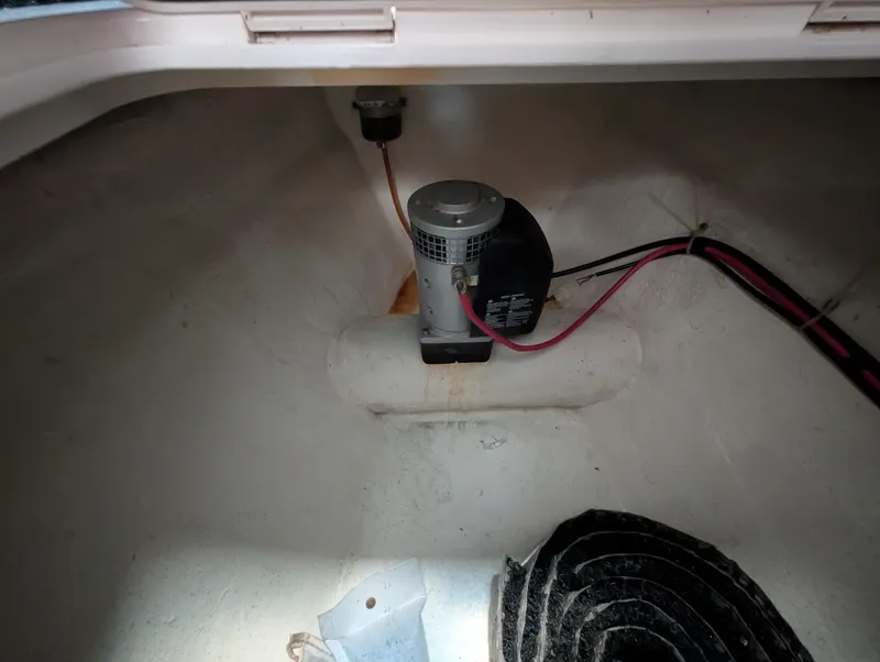Slide: The Image of Bilge area of 2000 Eastern Casco Bay 31 boat with pump and wiring. - 18