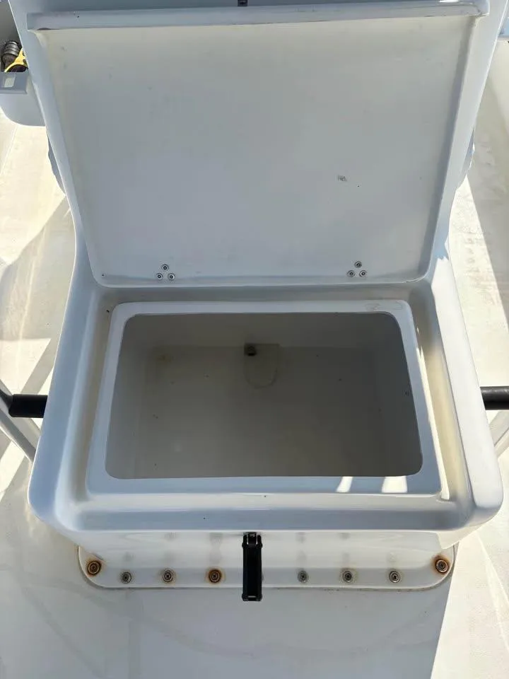 Slide: The Image of Open storage compartment on 2016 Panga American Panga boat. - 10