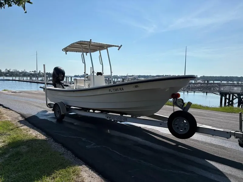 Slide: The Image of 2016 Panga American Panga boat on trailer by waterfront. - 3