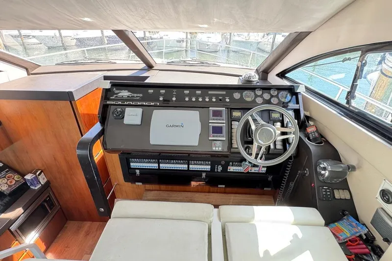 Slide: The Image of Cockpit inside A/C'd salon w/ Garmin navigation system and modern controls. - 14