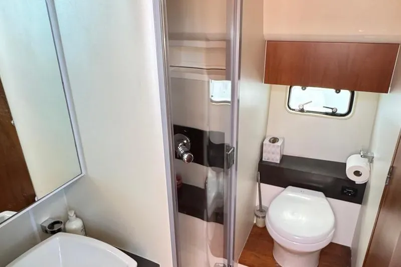 Slide: The Image of Bathroom interior of 2013 Fairline Squadron 42 yacht with shower and toilet. - 21