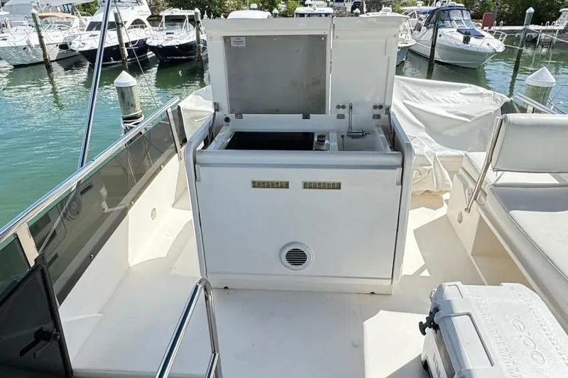 Slide: The Image of 2013 Fairline Squadron 42 yacht deck with open storage compartment. - 25
