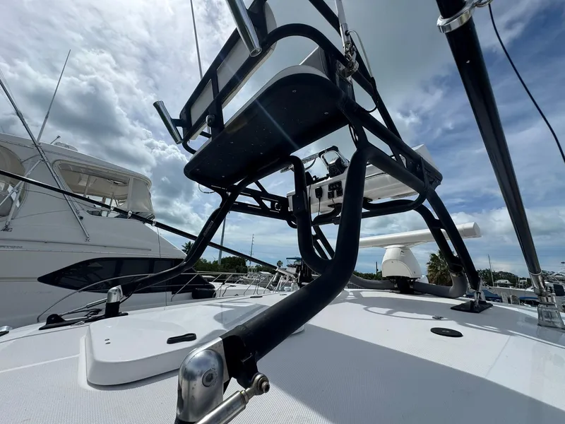 Slide: The Image of 2016 Everglades 355 Tournament boat with radar and tower, under cloudy sky. - 21