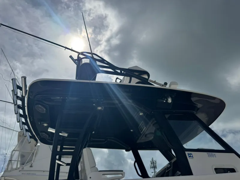 Slide: The Image of 2016 Everglades 355 Tournament boat under cloudy sky with sun rays. - 33