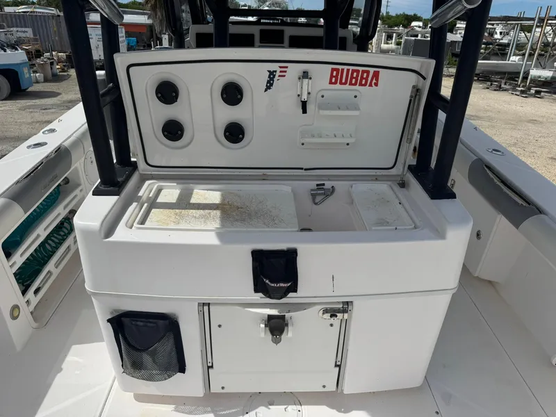 Slide: The Image of 2016 Everglades 355 Tournament boat with fishing station and storage compartments. - 8