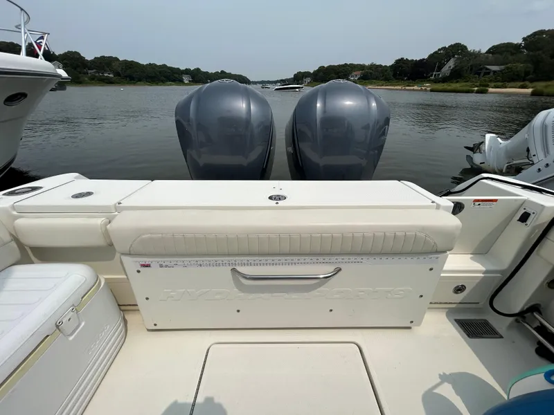 Slide: The Image of 2011 Hydra-Sports 3000 VX boat with dual engines on a calm river. - 11