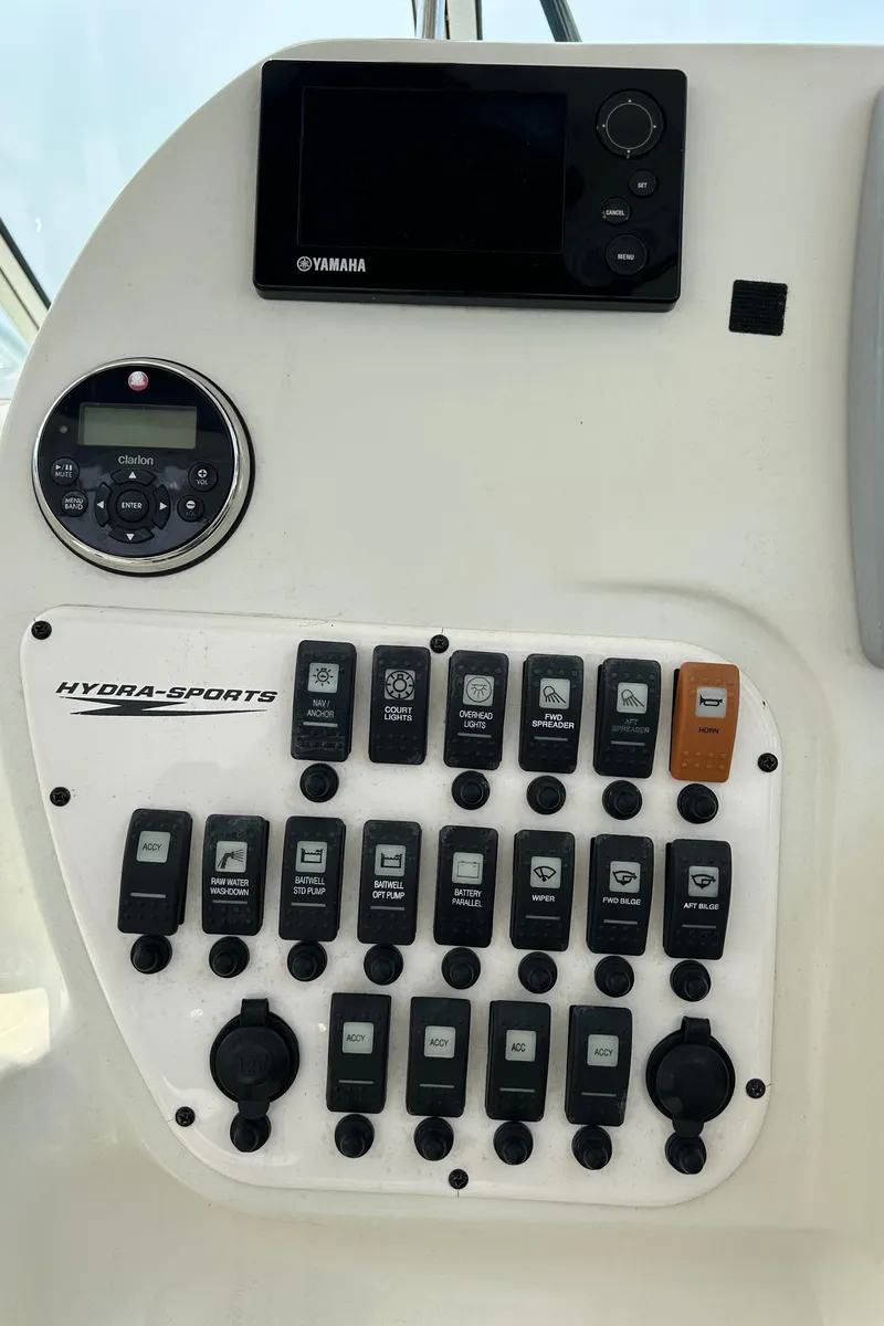 Slide: The Image of Garmin marine radio and GPS on 2011 Hydra-Sports 3000 VX boat dashboard. - 18