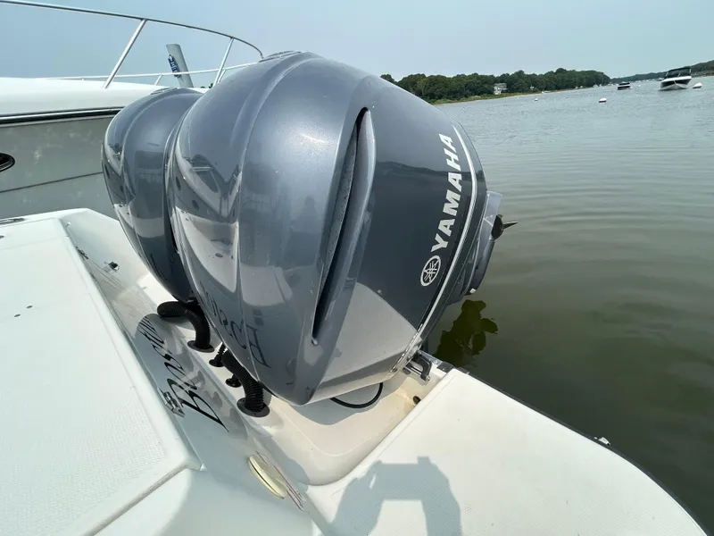 Slide: The Image of 2011 Hydra-Sports 3000 VX with Yamaha outboard motor on calm water. - 24