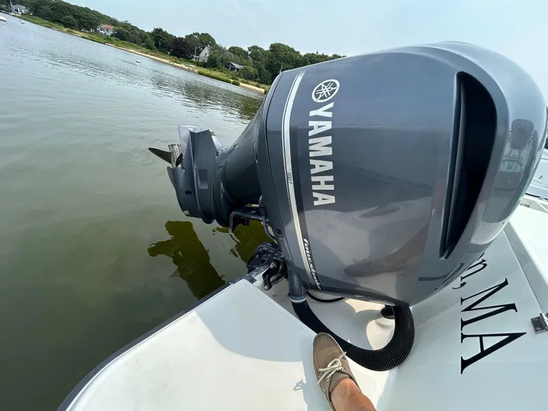 Slide: The Image of 2011 Hydra-Sports 3000 VX boat interior with white seating and control panel. - 25