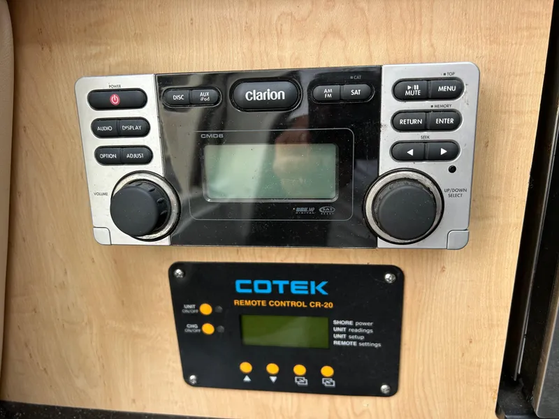 Slide: The Image of 2011 Hydra-Sports 3000 VX cabin interior with kitchenette, seating, and cozy sleeping area. - 35