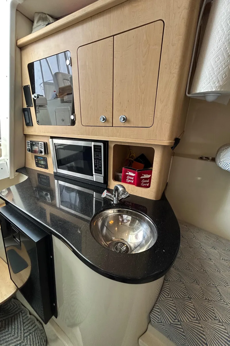 Slide: The Image of 2011 Hydra-Sports 3000 VX boat docked at marina under clear blue sky. - 67