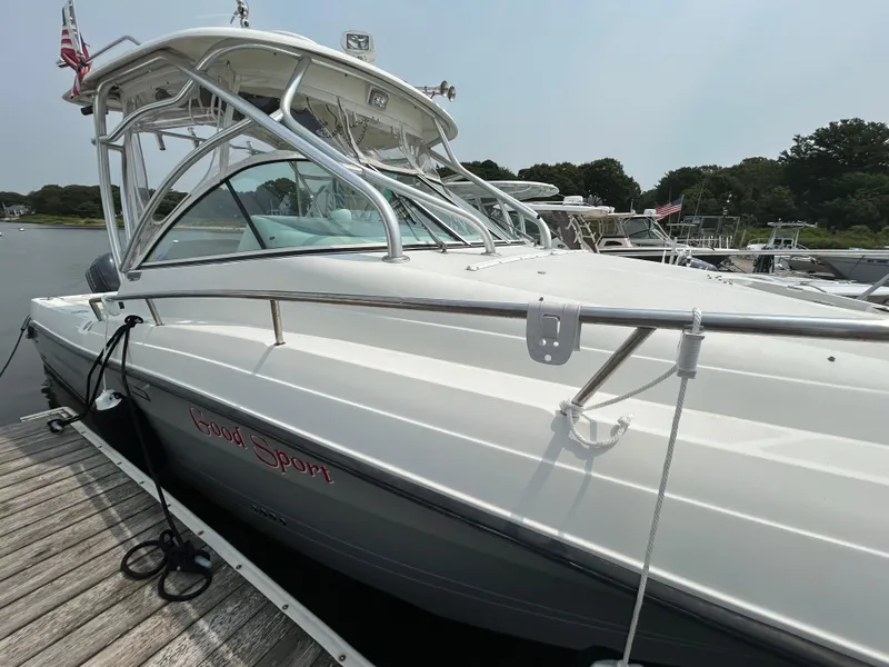 Slide: The Image of 2011 Hydra-Sports 3000 VX boat docked at a marina, side view. - 9