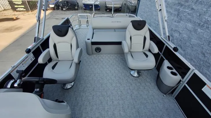 Slide: The Image of 2026 South Bay 224UL LE boat interior with plush seating and modern design. - 4