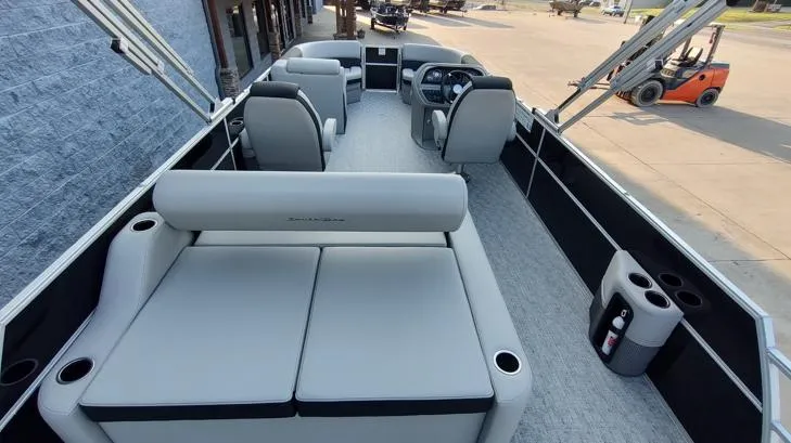 Slide: The Image of 2026 South Bay 224UL LE pontoon boat interior with spacious seating and modern design. - 8