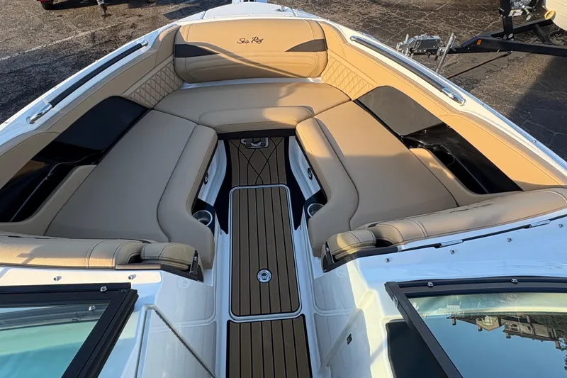 Slide: The Image of Luxurious interior of 2026 Sea Ray SLX 280 Outboard boat with tan seating. - 5
