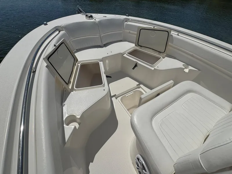Slide: The Image of Interior of 2011 Sea Fox 226 Commander boat with open storage compartments. - 10