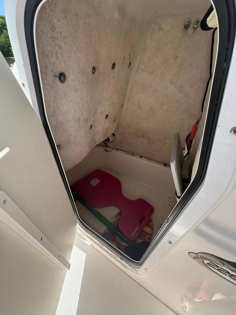 Slide: The Image of Interior storage compartment of a 2011 Sea Fox 226 Commander boat. - 14