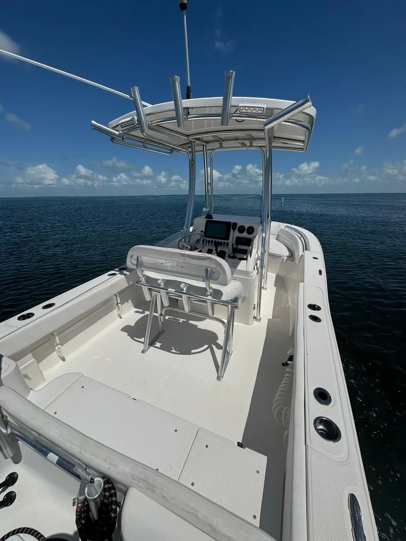 Slide: The Image of 2011 Sea Fox 226 Commander boat on calm ocean under clear blue sky. - 3