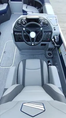 Slide: The Image of 2026 South Bay S224RS boat interior with modern steering console and seating. - 5