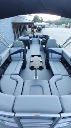 Slide: The Image of 2026 South Bay S224RS pontoon boat with spacious seating and modern design. - 6