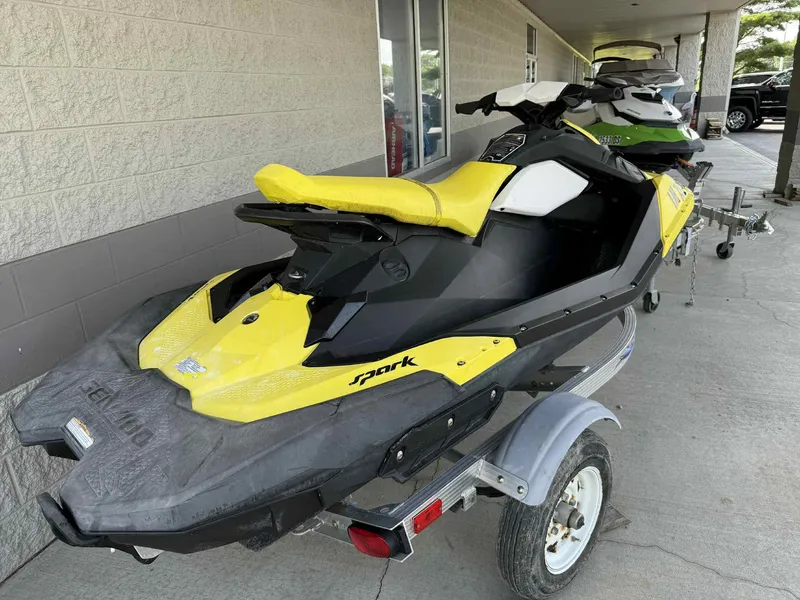 Slide: The Image of 2016 Sea-Doo Spark 2up jet ski in yellow on a trailer. - 3