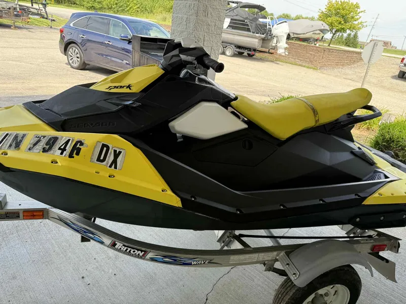 Slide: The Image of 2016 Sea-Doo Spark 2up jet ski on trailer, yellow and black design. - 7