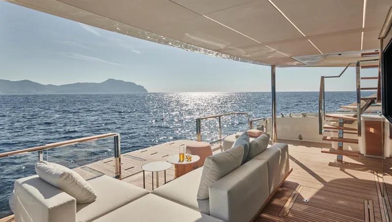 Slide: The Image of Luxurious Prestige M8 yacht deck with ocean view, modern seating, and elegant design, 2026 model. - 14