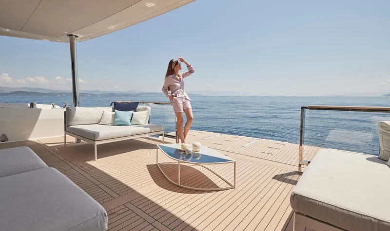 Slide: The Image of Luxury yacht deck with ocean view, featuring Prestige M8 model, 2026. - 15