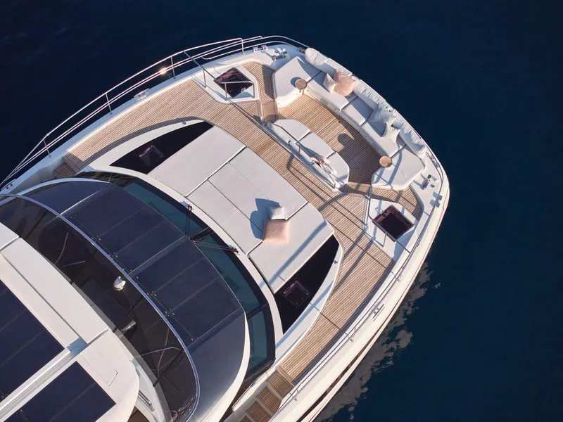 Slide: The Image of Luxurious 2026 Prestige M8 yacht deck with elegant seating and sleek design. - 3