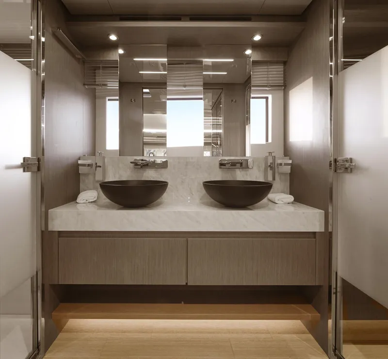 Slide: The Image of Modern bathroom with dual sinks and sleek design in a 2026 Prestige M8 model. - 35