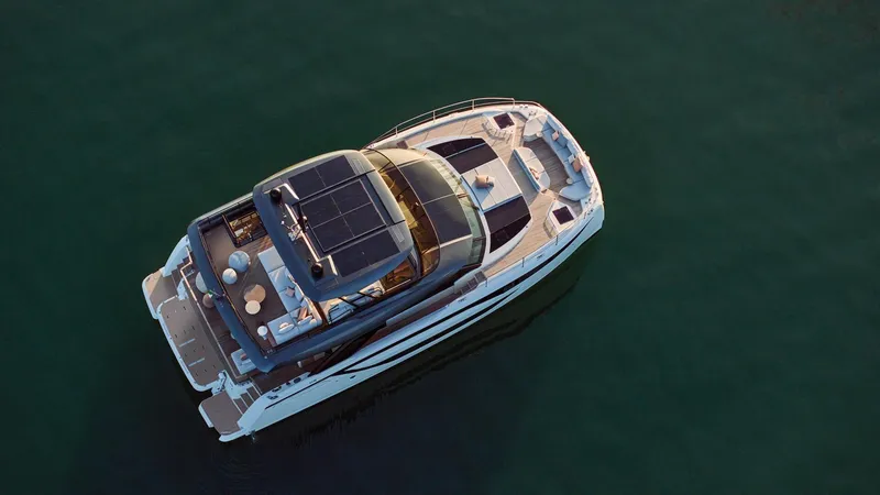 Slide: The Image of Aerial view of 2026 Prestige M8 yacht on calm water. - 38