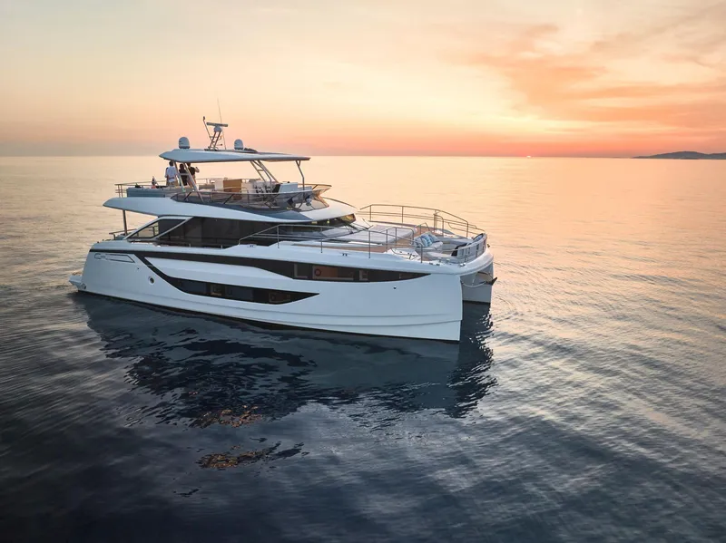 Slide: The Image of Luxury Prestige M8 yacht on serene ocean at sunset, 2026 model. - 9