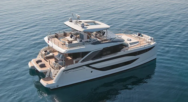 Slide: The Image of Luxurious 2026 Prestige M8 yacht cruising on calm blue waters. - 1