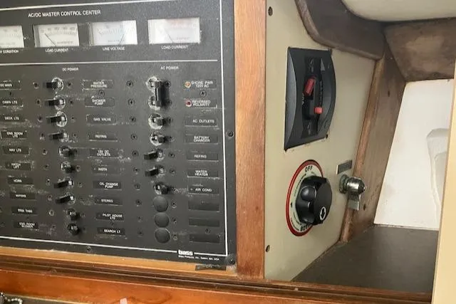 Slide: The Image of Electrical control panel on a 2001 Legacy Boat 28 Express. - 20