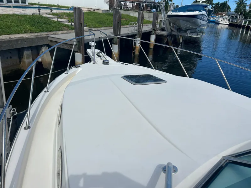 Slide: The Image of Wellcraft 330 Coastal 1999 - 98