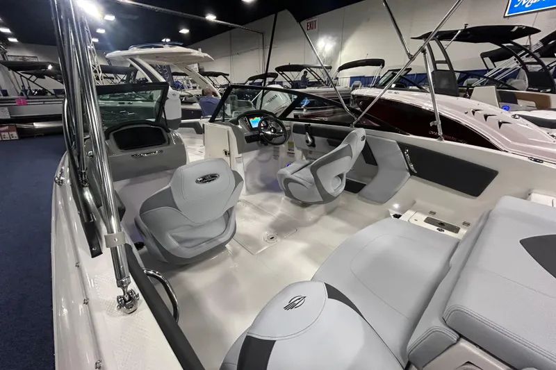 Slide: The Image of 2026 Chaparral 21 SSi Ski & Fish OB interior with modern seating and dashboard. - 5