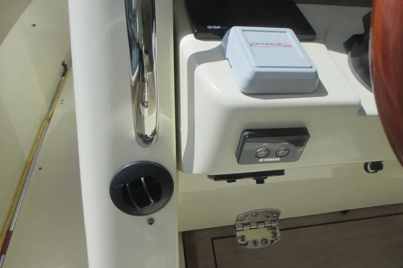 Slide: The Image of 2019 Chris-Craft Catalina 30 dashboard with Yamaha controls and Optimus EPS system. - 25