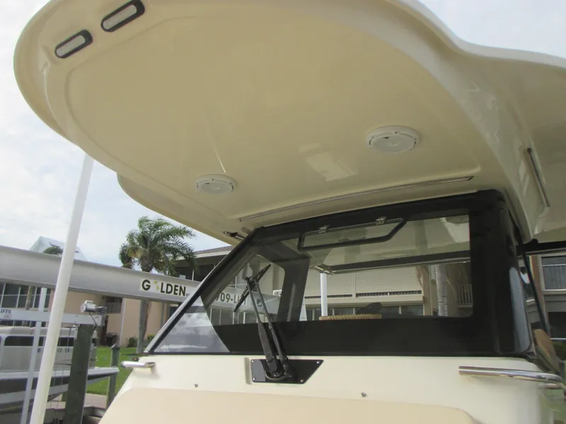 Slide: The Image of 2019 Chris-Craft Catalina 30 boat with a sleek hardtop and windshield. - 31