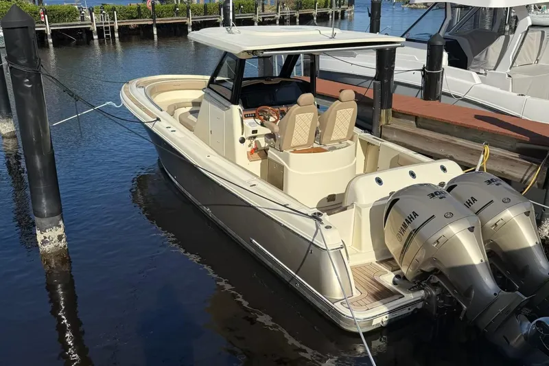 Slide: The Image of 2019 Chris-Craft Catalina 30 boat docked with twin Yamaha engines. - 6