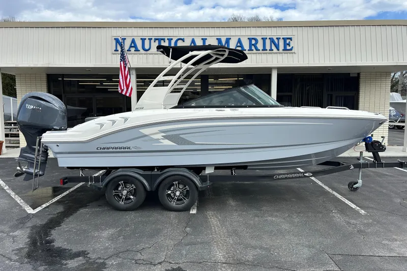 The Image of 2026 Chaparral 21 SSi OB boat on trailer at Nautical Marine dealership. - 0