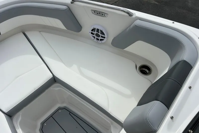 Slide: The Image of 2026 Chaparral 21 SSi OB boat interior with white and gray seating. - 14