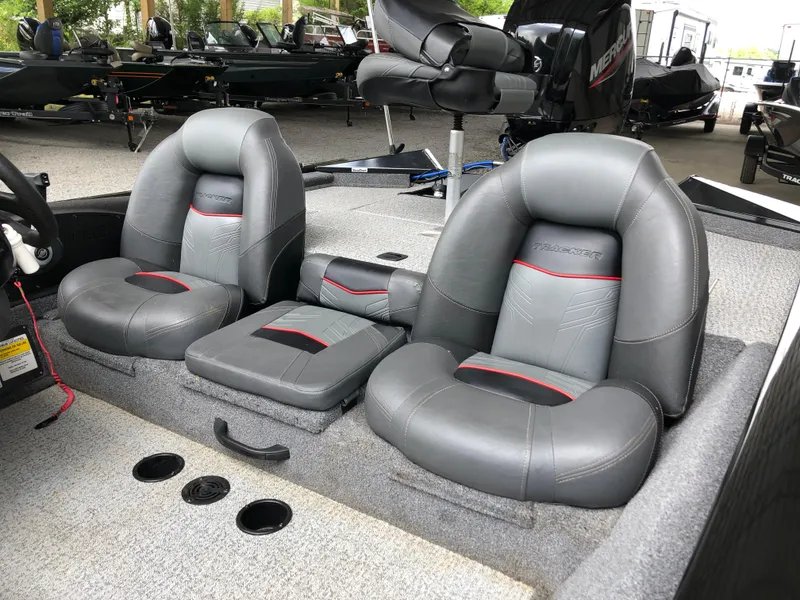 Slide: The Image of 2021 Bass Tracker PRO TEAM 175 TXW boat interior with gray seating. - 6