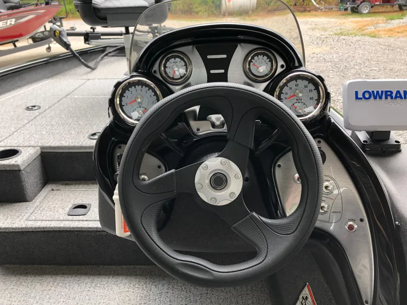 Slide: The Image of Steering console of 2021 Bass Tracker PRO TEAM 175 TXW with gauges and Lowrance device. - 8