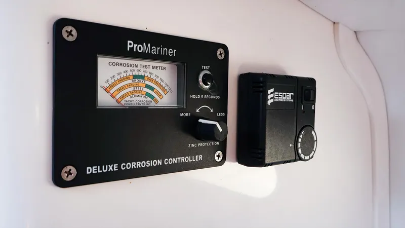 Slide: The Image of ProMariner corrosion controller and Espar heater system on 2004 True North 38 boat. - 12