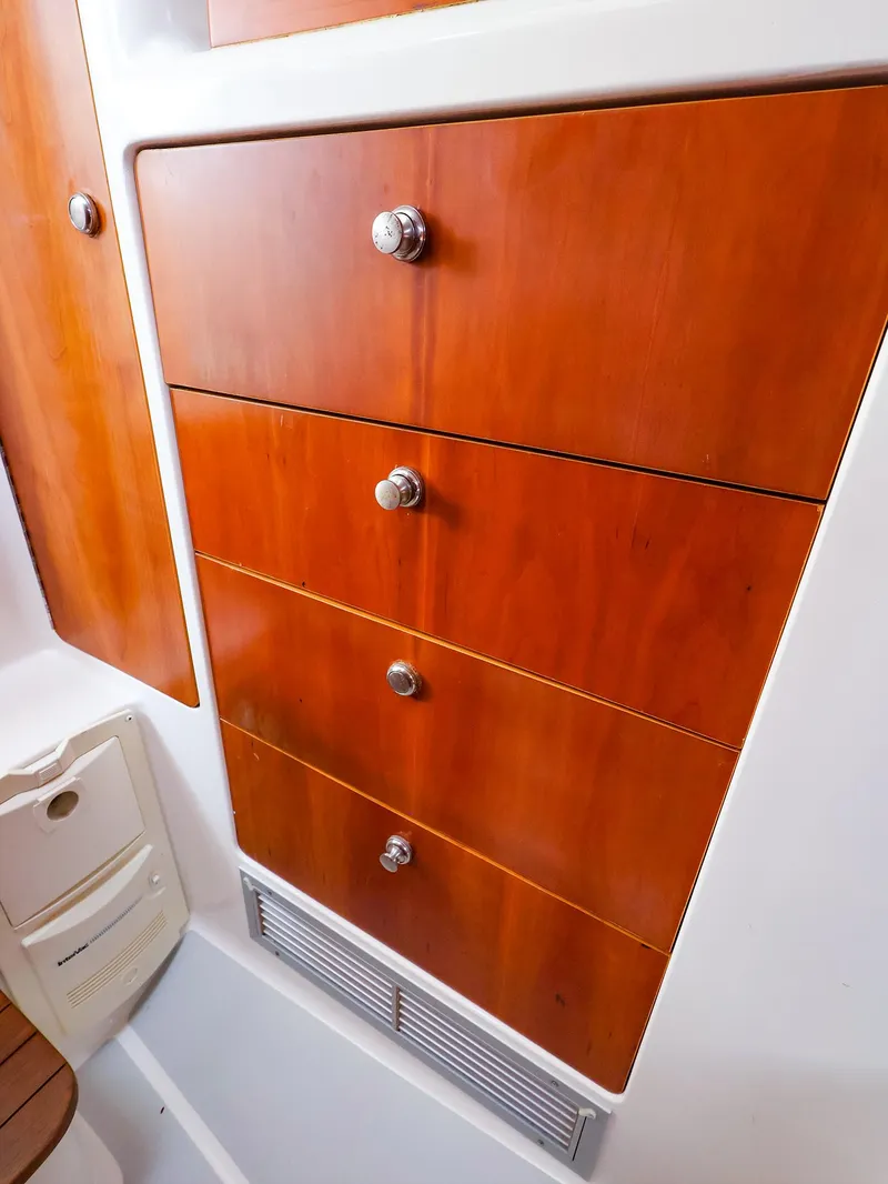 Slide: The Image of Wooden drawers in a 2004 True North 38 boat interior. - 34