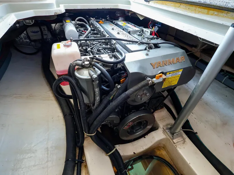Slide: The Image of Engine compartment of a 2004 True North 38 boat with Yanmar engine. - 38