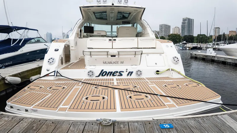 Slide: The Image of 2009 Sea Ray 470 Sundancer yacht docked at marina, rear view. - 17